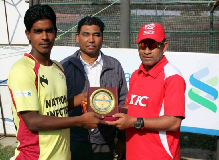 Hasim Ansari of R-2 (Birgunj) receiving the Player of the Match award from guest Mr. Jagat Tamatta (Chief Coach of National Sports Council)