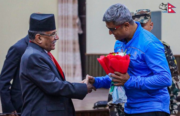 Coach Monty Desai with PrimeMinister Prachanda