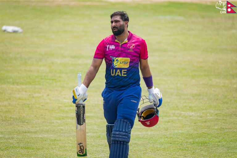Muhammad Waseem walks back