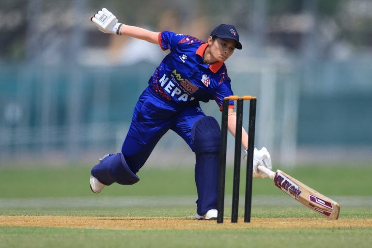 Bindu Rawal stretch to reach the crease