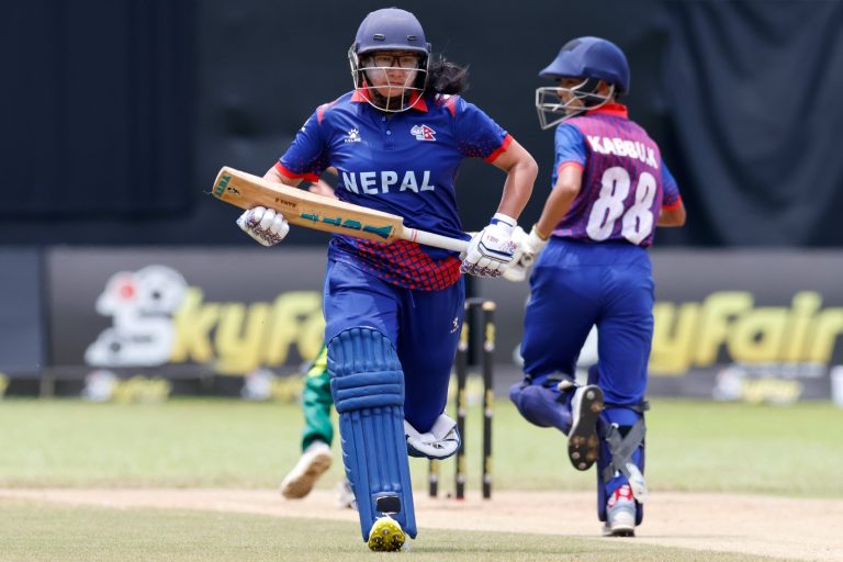 Sita Rana Magar running between the wicket with Kabita Kunwar