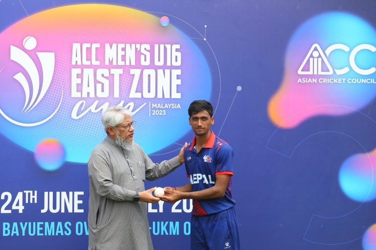 Abhishek Tiwari receives the match ball after picking up a fifer against Malaysia in the final of ACC U16 East Zone Cup