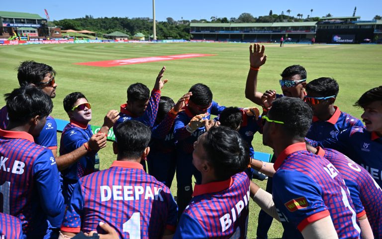 EAST LONDON, SOUTH AFRICA - JANUARY 21: Players of Nepal huddle during the ICC U19 Men's Cricket World Cup South Africa 2024 match between New Zealand and Nepal at Buffalo Park on January 21, 2024 in East London, South Africa. (Photo by Johan Rynners-ICC/ICC via Getty Images)