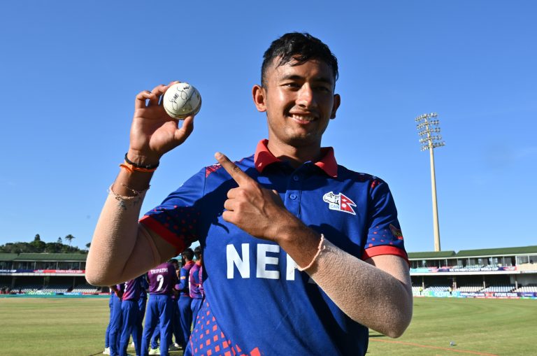 EAST LONDON, SOUTH AFRICA - JANUARY 26: Akash Chand of Nepal celebrates with the match ball after the team's victory during the ICC U19 Men's Cricket World Cup South Africa 2024 match between Afghanistan and Nepal at Buffalo Park on January 26, 2024 in East London, South Africa. (Photo by Johan Rynners-ICC/ICC via Getty Images)