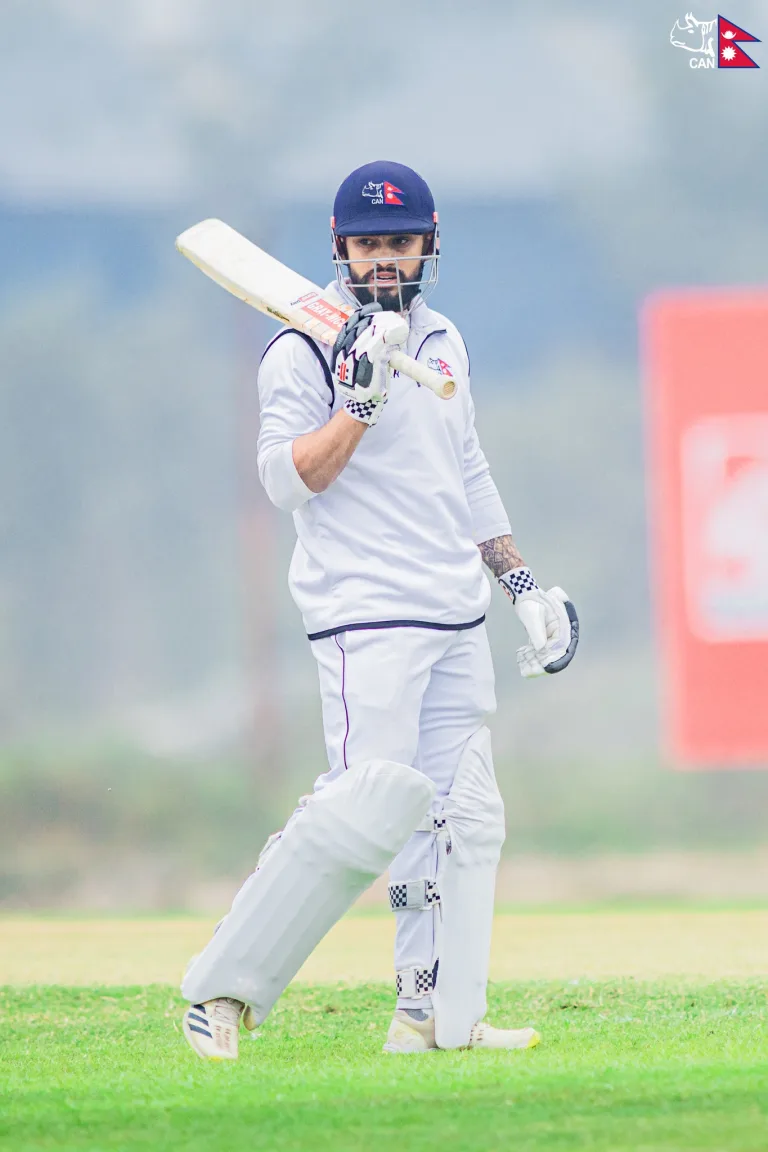 Kushal Bhurtel with a bat in hand