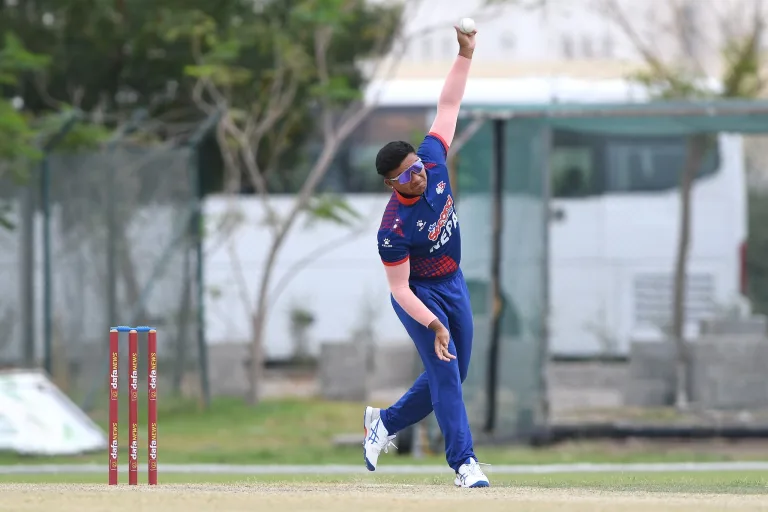 Kushal Malla of Nepal delivers a ball during the ACC Men's Premier Cup 2024 Group A match between Nepal and Malaysia held at the Al Amerat Cricket Ground Oman Cricket (Turf 1), Oman on April 12, 2024.

Photo by: Anshuman Akash / Creimas / Asian Cricket Council

RESTRICTED TO EDITORIAL USE