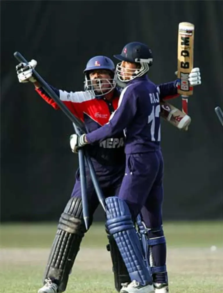 Ratan Rauniyar and Raj Shrestha embrace after Nepal's one-wicket win over New Zealand in the Plate final on Feb 18,  2006 Photo: ICC