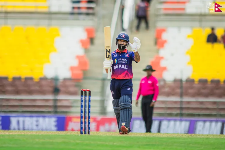 Dipendra Singh Airee celebrates after scoring his second ODI century for Nepal against the UAE in Cricket World Cup League 2. Photo: CAN