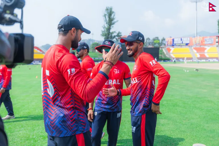 Ishan Pandey receives his ODI debut cap before Nepal's Cricket World Cup League 2 match against the United States in Kirtipur. Photo: CAN
