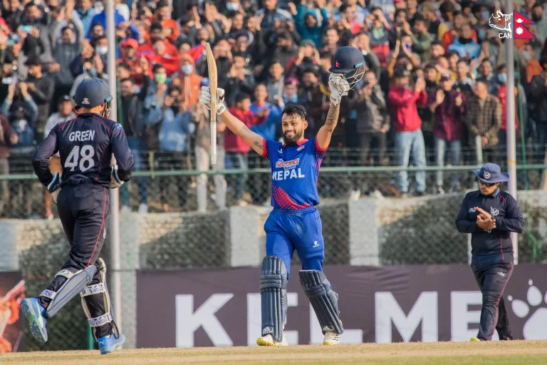 Kushal Bhurtel celebrates his maiden ODI century against Namibia in Kathmandu. Photo: CAN